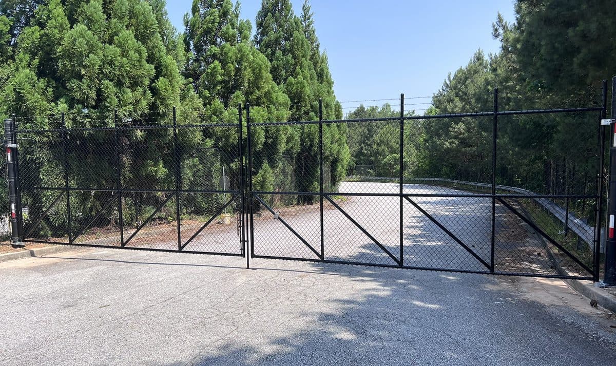 Black chain link double swing gate installation in Atlanta, GA