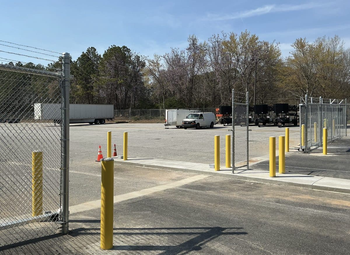 Commercial chain link perimeter fence with barbed wire in Georgia