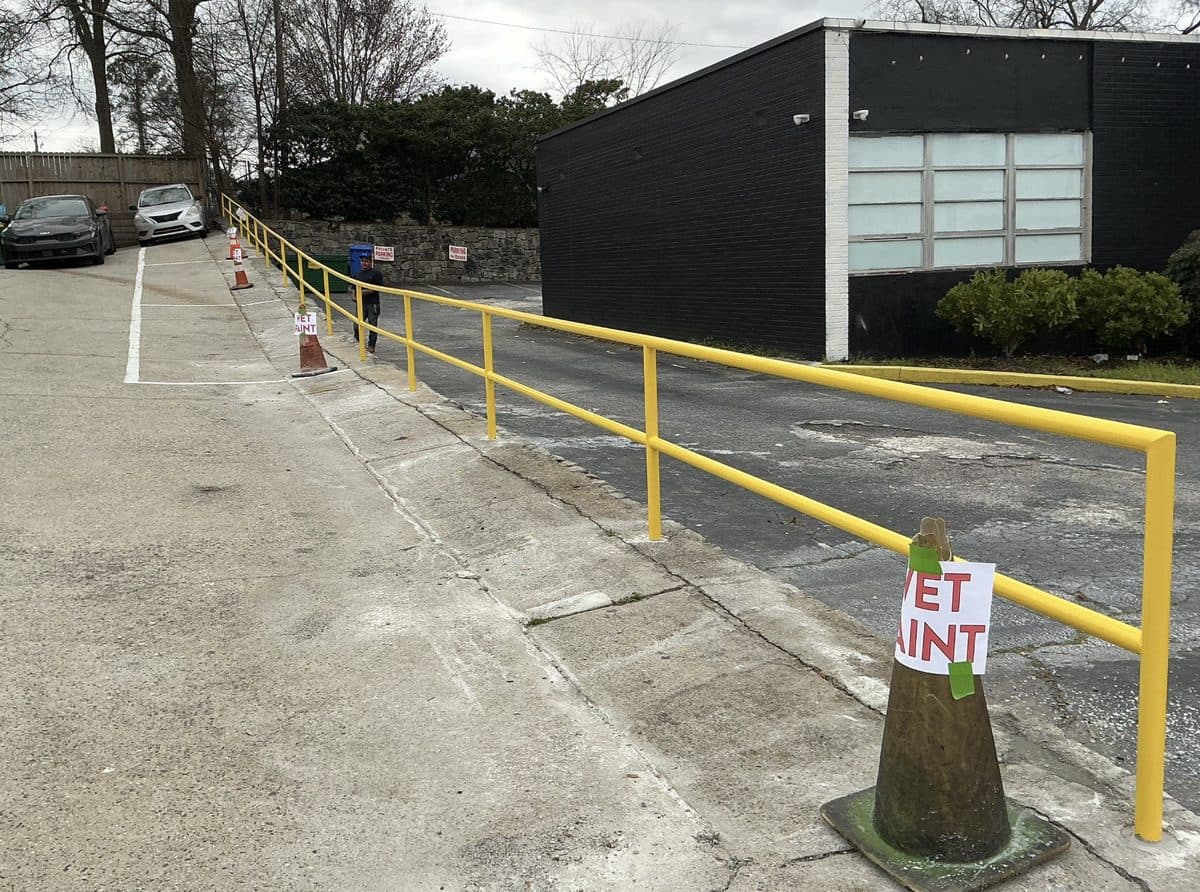 Commercial safety railing installation in parking area, Atlanta, GA