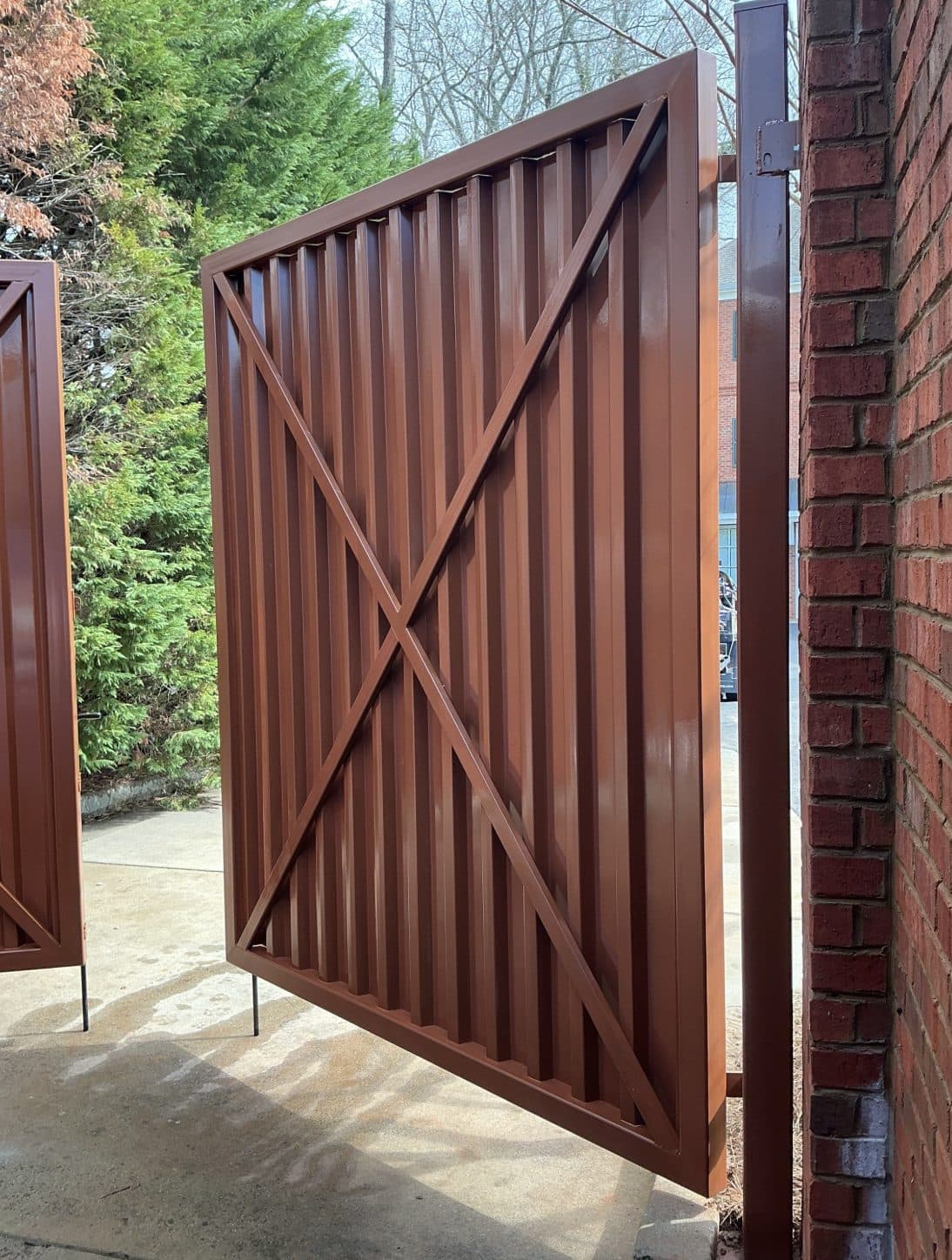 Custom X-brace dumpster gate panel detail, Atlanta, GA