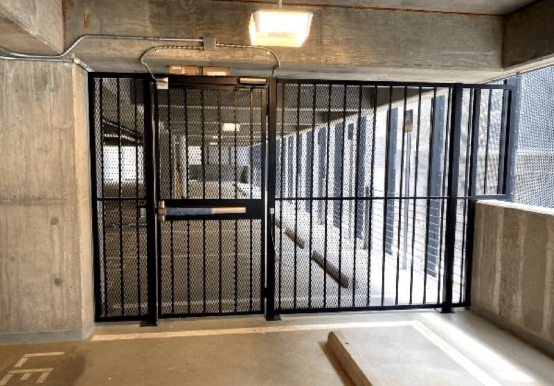 Parking garage cable railing and barrier system installed by Fence Workshop in Georgia