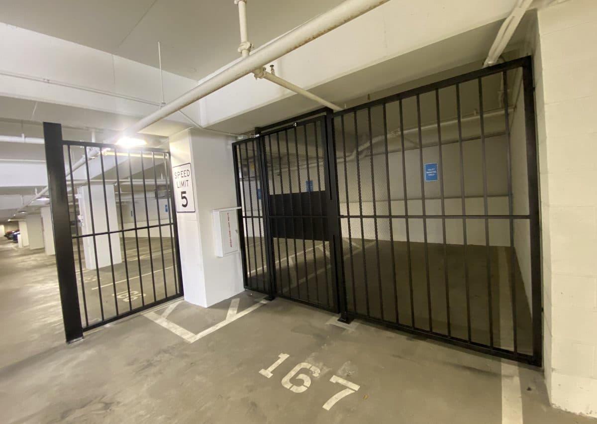 Parking garage steel fence with double swing gate in Georgia