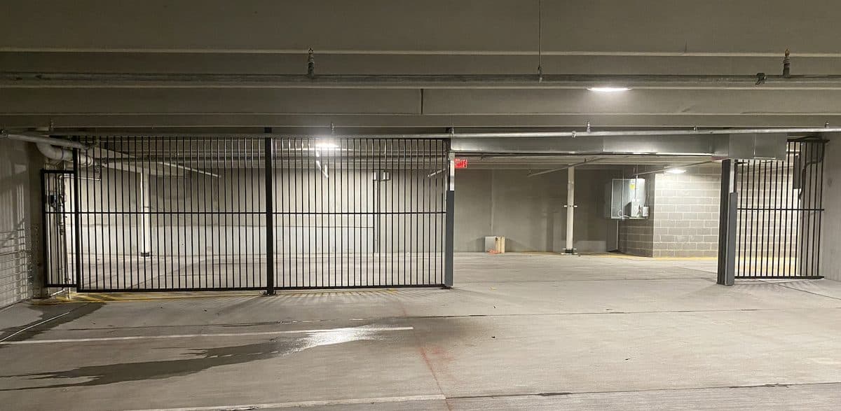 Interior parking garage security fence with double gate in Georgia