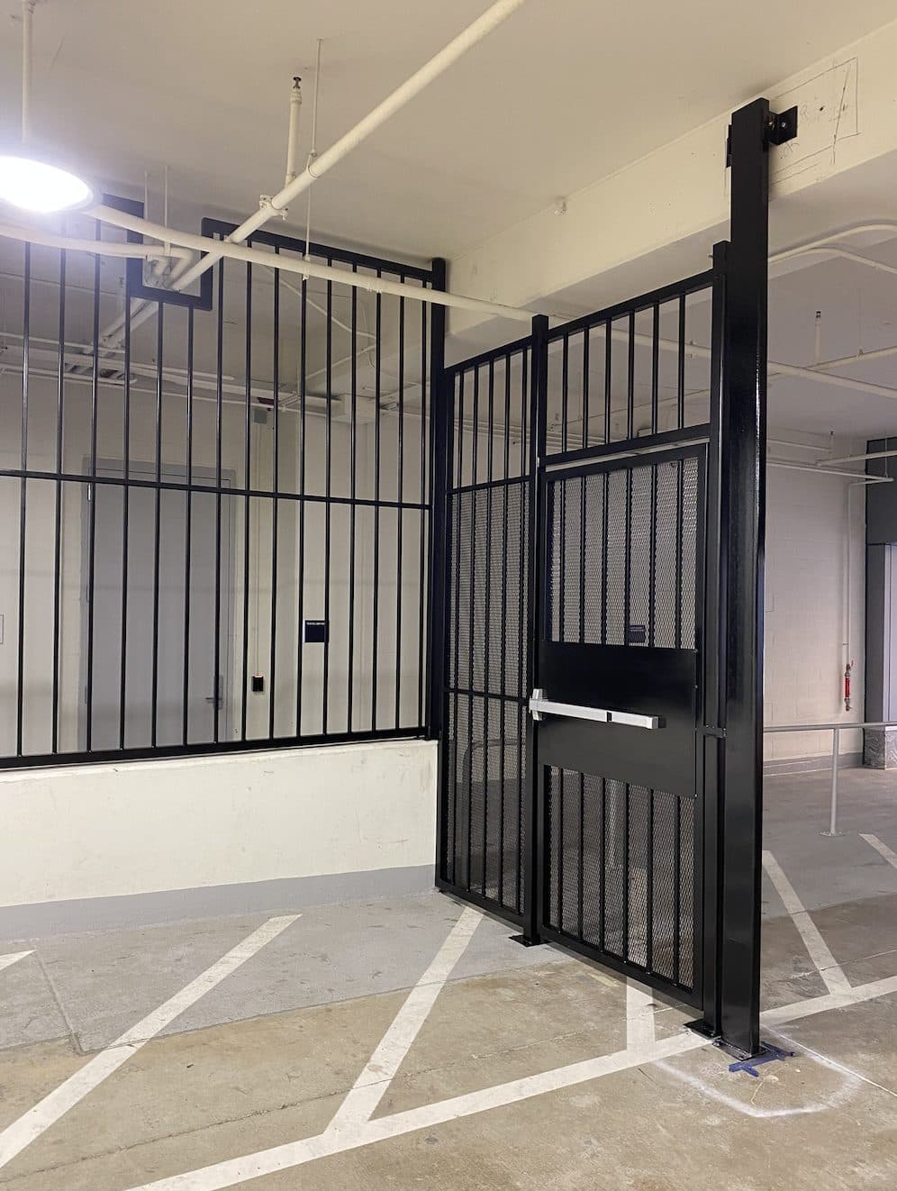 Parking garage steel fence with walk gate in Georgia