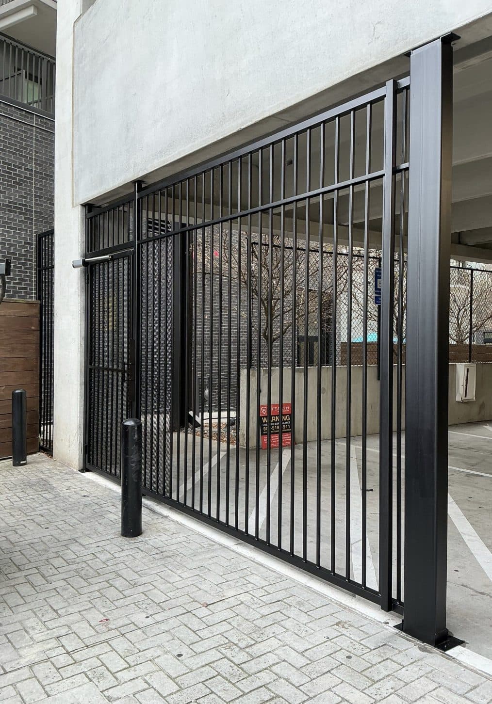 Parking structure exterior security gate with bollards in Georgia