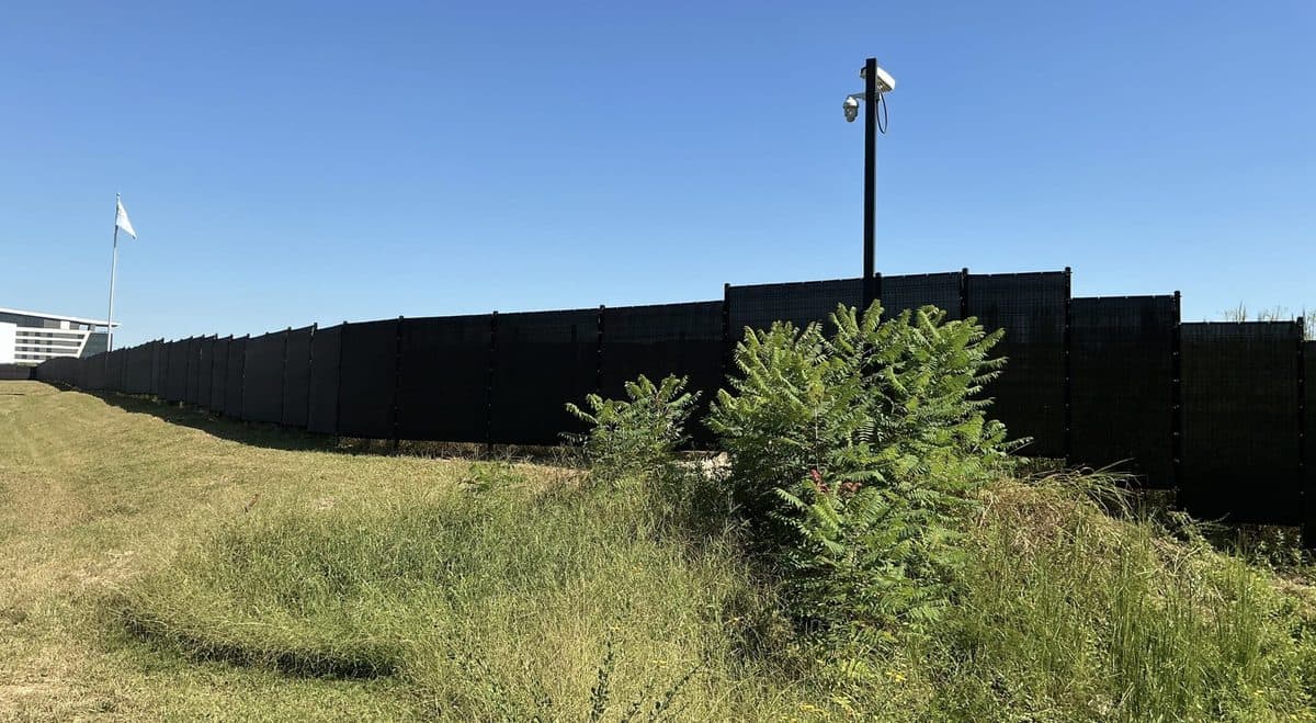 Security perimeter fence with surveillance camera in Georgia
